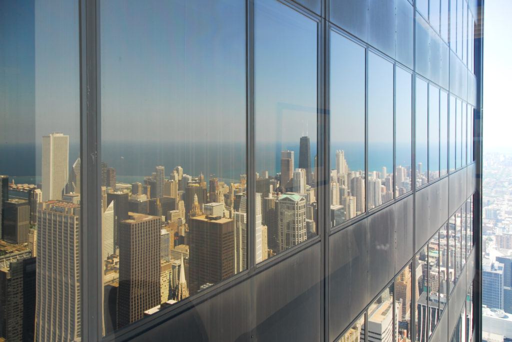 City skyline reflection in windows