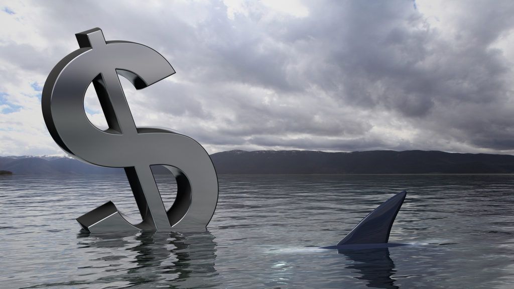 Dollar symbol sinking in the water